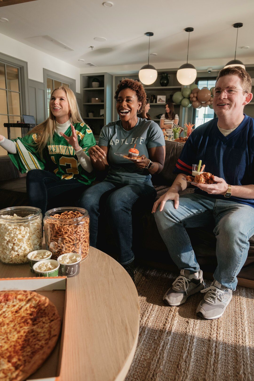 group of friends watching tv